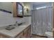 Bathroom with wood vanity and shower/tub at 1112 N Five Points Rd, Greenwood, IN 46143