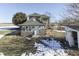 Two story green house with sunroom and detached shed at 1112 N Five Points Rd, Greenwood, IN 46143