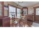 Bright eat-in kitchen with wood cabinets and a built-in hutch at 1112 N Five Points Rd, Greenwood, IN 46143