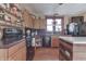 Spacious kitchen with wood cabinets, island, and a ceiling fan at 1112 N Five Points Rd, Greenwood, IN 46143