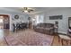 Open concept living and dining areas with hardwood floors at 1112 N Five Points Rd, Greenwood, IN 46143