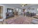 Living room with hardwood floors and a large TV at 1112 N Five Points Rd, Greenwood, IN 46143