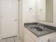 Bathroom with a vanity with dark countertop and a tiled floor at 13398 N Largo Ct, Camby, IN 46113