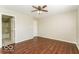 Simple bedroom with hardwood floors and access to a full bathroom at 13398 N Largo Ct, Camby, IN 46113