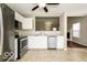 Modern kitchen with stainless steel appliances and white cabinets at 13398 N Largo Ct, Camby, IN 46113