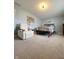 Bright bedroom with large windows and comfortable seating at 134 President W Trl, Indianapolis, IN 46229