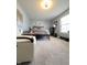 Spacious bedroom with large windows and comfortable seating at 134 President W Trl, Indianapolis, IN 46229