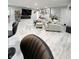 Spacious finished basement with comfortable seating and large TV at 134 President W Trl, Indianapolis, IN 46229