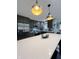 Modern kitchen with gray cabinets, stainless steel appliances, and an island at 134 President W Trl, Indianapolis, IN 46229