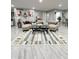 Spacious living room with sectional sofa and large rug at 134 President W Trl, Indianapolis, IN 46229