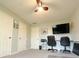 Home office with ample workspace and built-in shelving at 134 President W Trl, Indianapolis, IN 46229