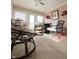 Bright sunroom features ample seating and a relaxing atmosphere at 134 President W Trl, Indianapolis, IN 46229