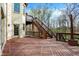 Expansive deck with stairs offers outdoor living space and access to the yard at 14565 Geist Ridge Dr, Fishers, IN 46040