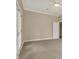 Bright bedroom with neutral color, plush carpet, and white trim offers a serene retreat at 14565 Geist Ridge Dr, Fishers, IN 46040