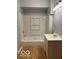 Updated bathroom with a tub/shower combo and white vanity at 252 Ringwood Way, Anderson, IN 46013