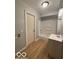 Clean bathroom with tub, shower, and a vanity with sink at 252 Ringwood Way, Anderson, IN 46013