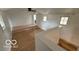 Versatile bonus room featuring hardwood floors, natural light, and ample space for activities at 252 Ringwood Way, Anderson, IN 46013