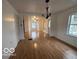 Bright living room with hardwood floors and lots of natural light at 252 Ringwood Way, Anderson, IN 46013