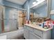 Bathroom with vanity, shower and bathtub at 2814 Brookside Ave, Indianapolis, IN 46218