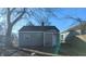 Gray vinyl-sided house with a back door and walkway at 2925 Stuart St, Indianapolis, IN 46218