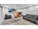 Finished basement with a basketball arcade game, fireplace and seating at 4549 Pepper Ct, Indianapolis, IN 46237