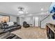 Finished basement with home theater, comfortable seating, and additional storage at 4549 Pepper Ct, Indianapolis, IN 46237