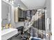 Clean bathroom with a shower/tub combo and modern vanity at 4549 Pepper Ct, Indianapolis, IN 46237