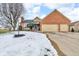 Brick ranch home with attached two-car garage and landscaping at 4549 Pepper Ct, Indianapolis, IN 46237