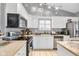 Modern kitchen with white cabinets, stainless steel appliances, and granite countertops at 4549 Pepper Ct, Indianapolis, IN 46237