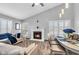Spacious living room with fireplace, and dining area at 4549 Pepper Ct, Indianapolis, IN 46237