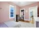 bedroom with a toy kitchen, closet, and hardwood floors at 4616 Carrollton Ave, Indianapolis, IN 46205