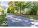Trail view surrounded by lush trees at 4616 Carrollton Ave, Indianapolis, IN 46205