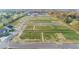 Great aerial view of several vacant lots and a new home surrounded by lush greenery in a peaceful community at 4976 Elaine Ct, Noblesville, IN 46062