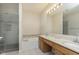 Bathroom boasts double sinks, granite vanity, and a tub at 5437 Basin Park Dr, Indianapolis, IN 46239