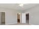Bedroom with ensuite bathroom and walk-in closet at 5437 Basin Park Dr, Indianapolis, IN 46239