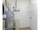 Laundry area with water heater and shelving at 5437 Basin Park Dr, Indianapolis, IN 46239