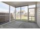 Spacious screened porch overlooking backyard at 5437 Basin Park Dr, Indianapolis, IN 46239