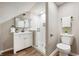 Modern bathroom featuring a glass enclosed shower, wood-look floor, and modern fixtures at 550 Trowbridge St, Indianapolis, IN 46203