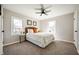 Cozy bedroom featuring natural light from the two windows and a ceiling fan at 550 Trowbridge St, Indianapolis, IN 46203