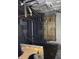 Unfinished basement with exposed pipes and wooden beams at , Indianapolis, IN 46202