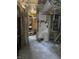 A damaged hallway with debris and exposed ceiling at , Indianapolis, IN 46202