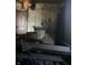 A room in need of complete renovation with damaged walls at , Indianapolis, IN 46202