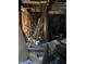 A cluttered interior space with exposed framing and debris at , Indianapolis, IN 46202