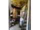 Damaged kitchen with exposed pipes and debris at , Indianapolis, IN 46202