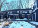 Front view of a charming blue two-story home with attached garage at 7841 Harbour # 35, Indianapolis, IN 46240
