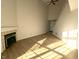 High-ceiling living room with fireplace and laminate flooring at 7841 Harbour # 35, Indianapolis, IN 46240