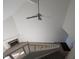 View from upstairs showing the staircase and living room below at 7841 Harbour # 35, Indianapolis, IN 46240