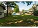 Expansive backyard featuring a pool and shed at 877 Revere Ct, Greenwood, IN 46142