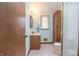 Small bathroom with wood cabinets and tiled floor at 877 Revere Ct, Greenwood, IN 46142