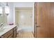Clean bathroom with tub and vanity at 877 Revere Ct, Greenwood, IN 46142